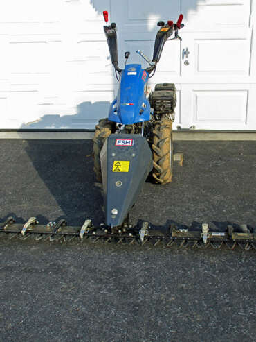 Sickle bar mower I&J Mfg /Esm mouted on a BCS Trackor